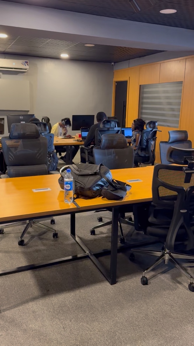 The Lagos team working late at their desks
