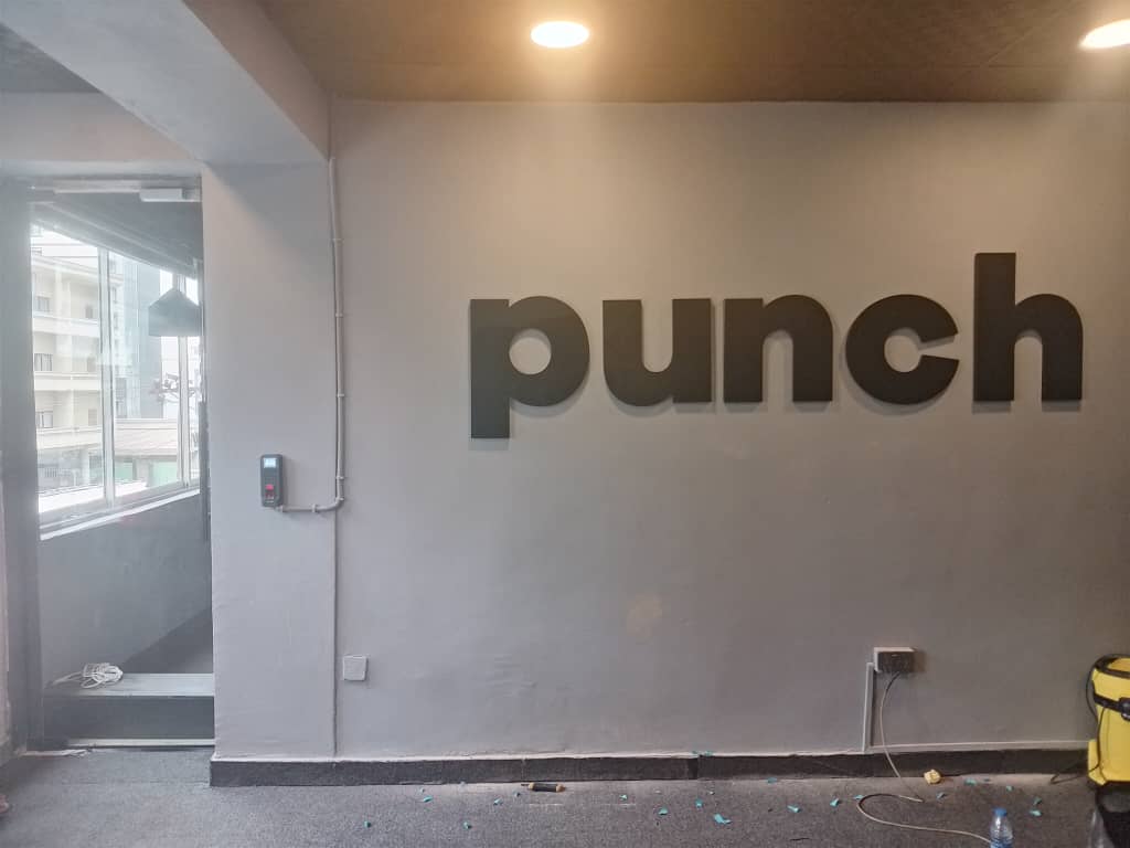 The punch sign going up on the Lahore office wall